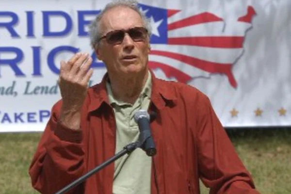 an image of Cint Eastwood having a speech
